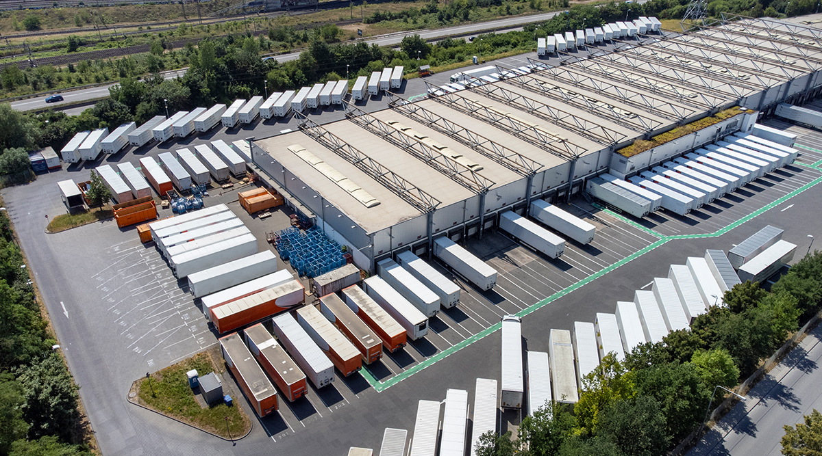 aerial view of distribution logistics building parking lot