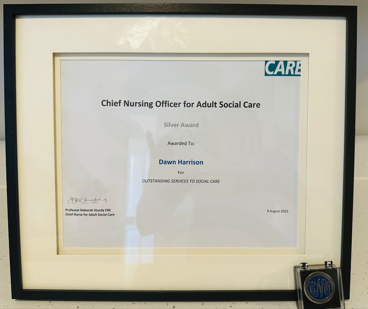 Silver Award presented for Outstanding Services to Social Care