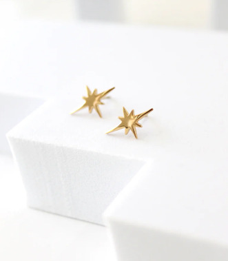 Gold Starburst Stud earrings by STUDIYO Jewelry, featuring a sleek, minimalist star design.