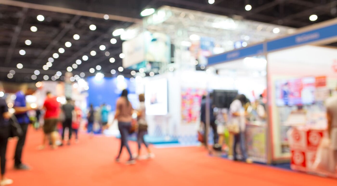 Abstract blurred event exhibition with people background