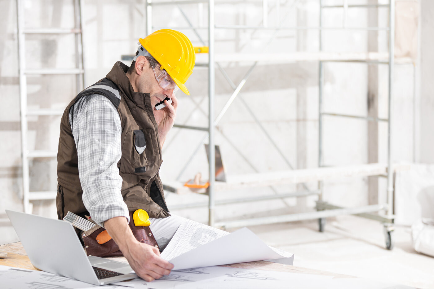 contractor looking at plans