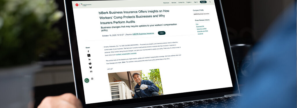 man reading article on laptop