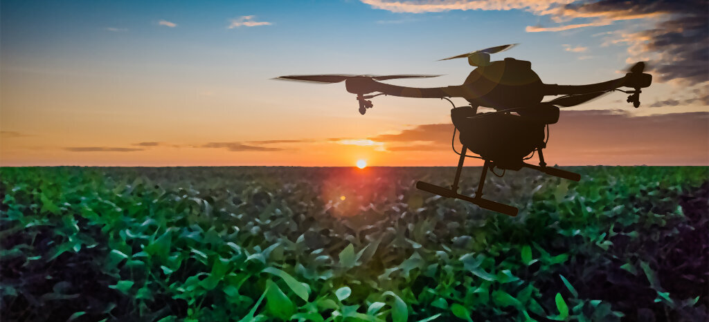 drone in flight over field