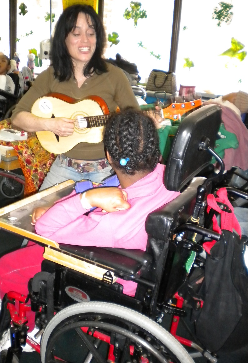 One of the teaching artists and student in the Arts Horizons ArtBeat Program