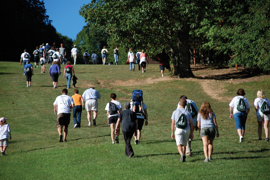 Hikers Ascending Ski Slope