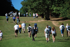 Hikers Ascending Ski Slope
