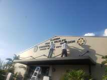 Dolphin Painting Transforms U.S. Fish and Wildlife Service Facility in Fort Lauderdale 