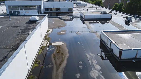 The Hidden Costs of Ignoring Minor Roof Ponding on Flat Commercial Roofs