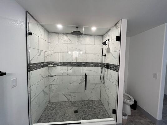 Colorado Glass and Mirror LLC Addresses Frameless Shower Door Installation Gap with Lifetime Warranty