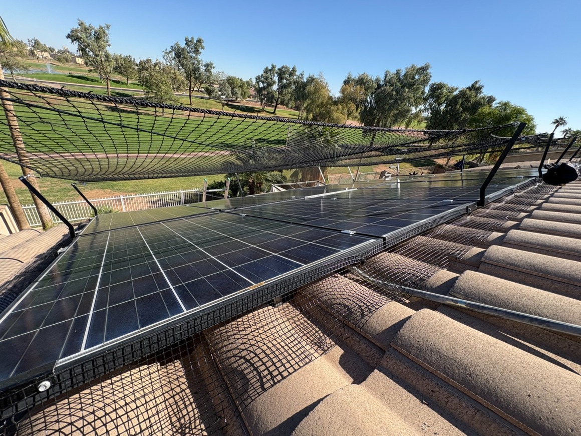 Custom solar panel protection system installed on a home in an Arizona golf course community